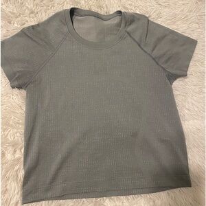 RARE grey lululemon swiftly tech | size 4 | minor stain
